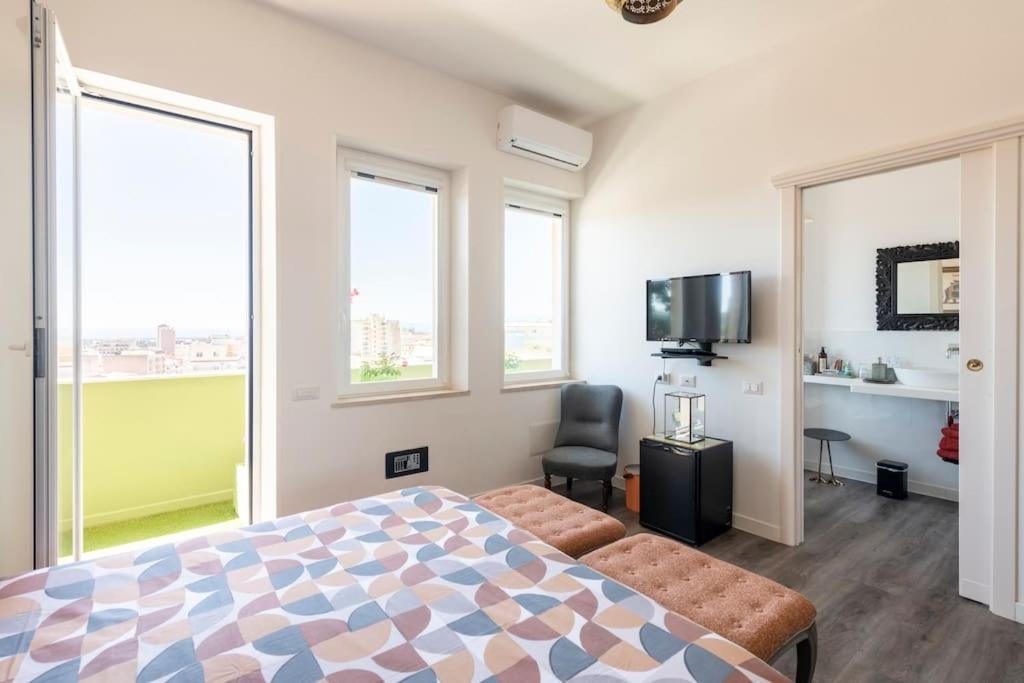 Eleventh Floor Suites Cagliari Esterno foto